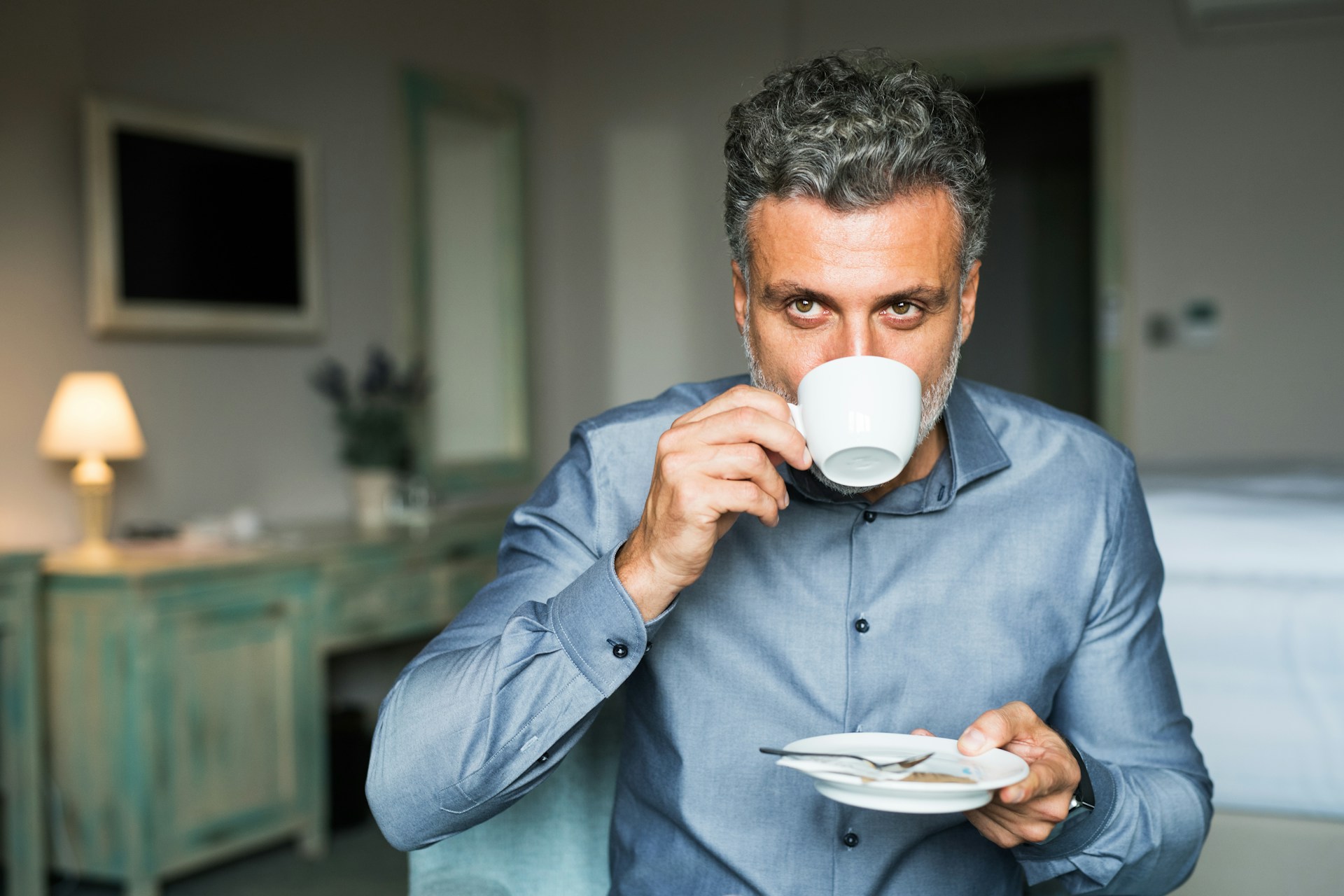 man drinking tea